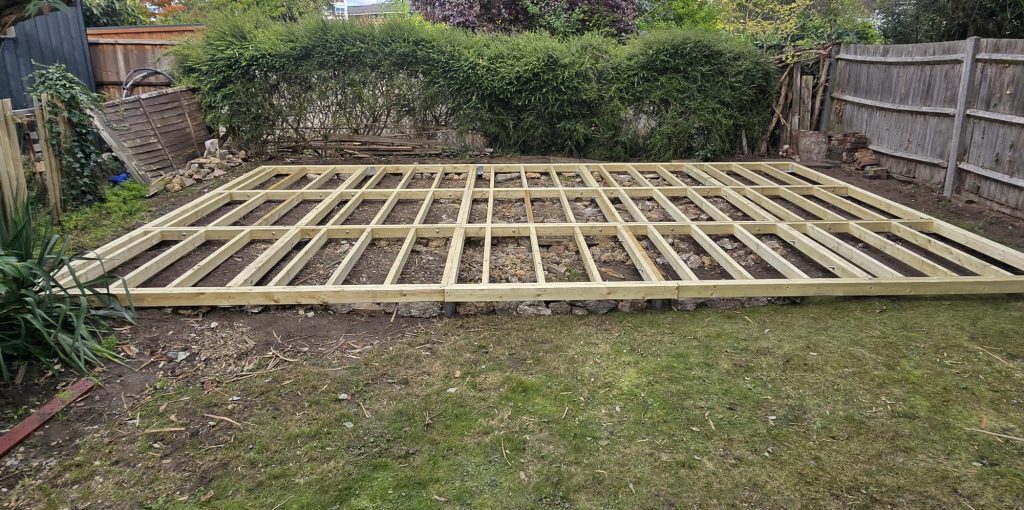 Timber joist base for a garden room project in Epsom